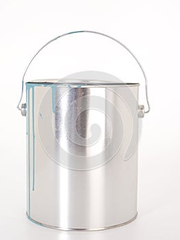 Chrome paint can with blue drips