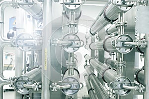 Chrome pipes in heating and AC rooms in buildings of factories a