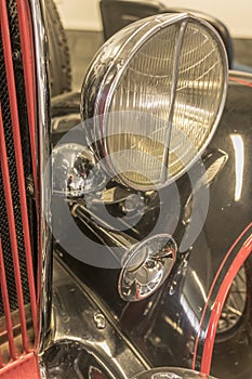 Chrome plated light and horn of vintage car, Wanaka, New Zealand