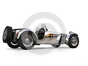 Chrome plated vintage sport open wheel racing car - back side view