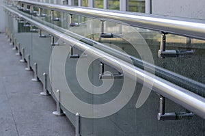 Chrome railing outside the building