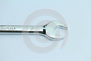 A chrome vanadium wrench on white background.Tools for plumbers and motor vehicle mechanics.