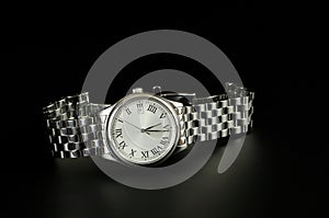 Chrome watch on black