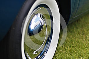 Chrome Wheel With White-Wall Tire On A Classic Car