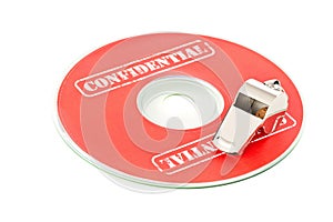 Chrome whistle on CD or DVD with confidential top secret data over white background - whistleblower concept