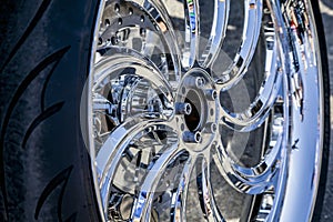 Chromed car wheels with disc brakes, close-up photo