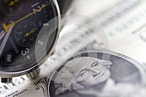 Chronograph luxury watch on one dollar bills