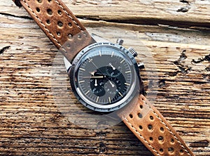 Chronograph wrist watch with metal or leather strap. Swiss made.