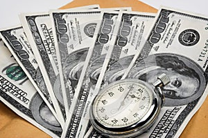 Chronometer and dollar bills
