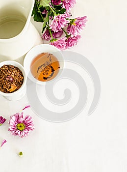 Chrysanthemum flowers and roibos tea on
