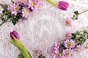 Chrysanthemum and tulips on table