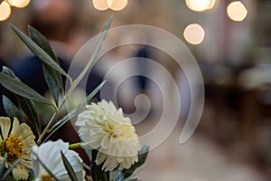 chrysanthemums, daises and olive leafs bouquet