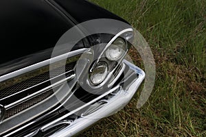 Black Chrysler 300 left headlight