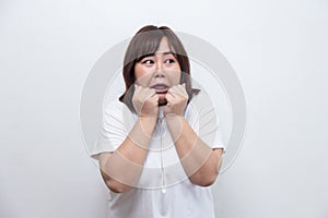 Chubby Asian Woman with Scared Face