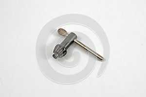 Drill chuck key on white background