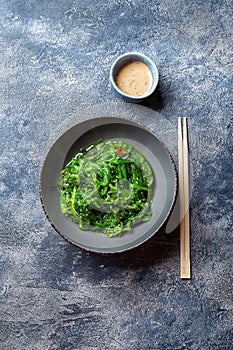 Chuka wakame, seaweed japanese salad with nuts sauce