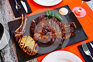 Chuleton is a popular Spanish dish made from a beef steak photo