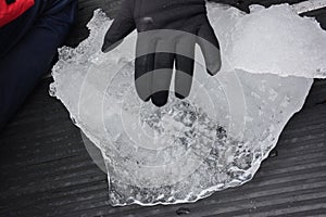 A chunk of ice showing the layers of summer melt
