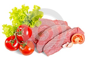 Chunks fresh beef, lettuce and tomatoes isolated on white background.