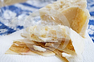 Chunks and rind of parmigiano cheese