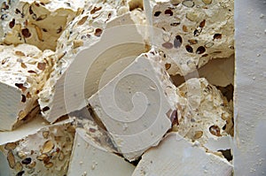 Chunks of white torrone with almonds