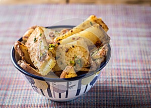 Chunky chips garnished and served in a pretty bowl