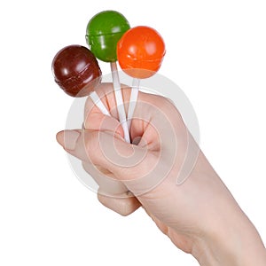 Chupa Chups candy in hand