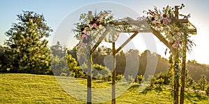 Chuppah on a lawn with a picturesque view