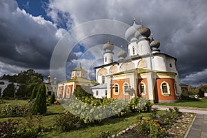 church against the background of a stormy sky in the Tikhvin Bogorodichny Uspensky .Male Monastery