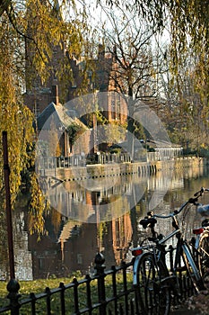 Church Along Canal In Brugges, Belgium