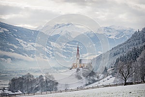 Church in alpine Zillertal valley in winter