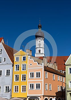 Church of the Assumption of Mary and colorful buildings in Landsberg city Germany photo