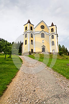 Church of Assumption in sunny mountains, Neratov, Czech republic photo