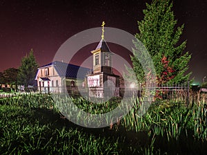 The Church on the background of the starry sky.