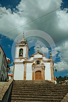 Church in baroque style with steeple and staircase