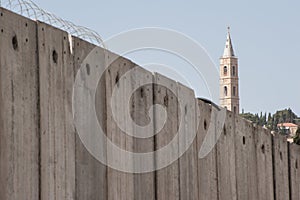 Church behind Israeli separation wall