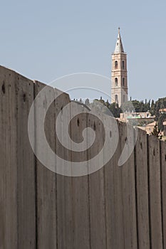 Church behind Israeli separation wall