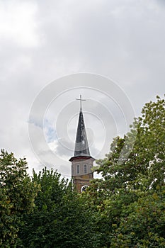 church behinde trees
