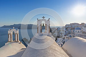 Church bell in oia, Santorini. Sunset. Greece.