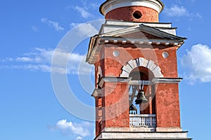 Church Bell Tower Close-Up Against A Blue Sky