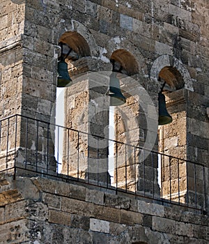 Church bells from traditional church at Bochali area of Zakynthos island in Greece photo