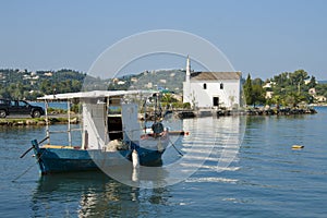 Church and boat in Gouvia, Corfu