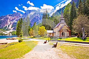 Church and Braies lake in Dolomite Apls
