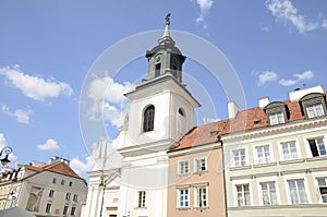 Church among buildings  in Warsaw