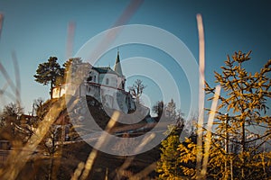 Church called Zasavska sveta gora, on a sunny winter day. Beautiful religious chuch on the top of the hill. Sinny day at the