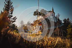 Church called Zasavska sveta gora, on a sunny winter day. Beautiful religious chuch on the top of the hill. Sinny day at the