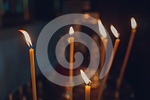 Church candles on the background bokeh close-up.