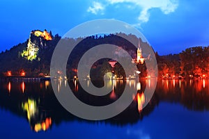 Church and castle in Bled lake in Slovenia evening