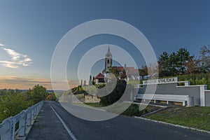 Church castle and old houses in old town Melnik in central Bohemia with sunset