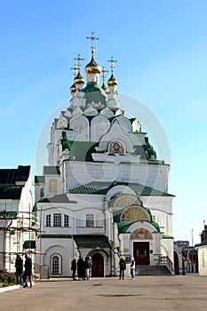 A beautiful church stands in the city on a sunny autumn day.